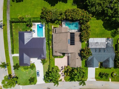 Welcome to this architectural gem in Eastpointe Country Club on Eastpointe Country Club in Florida - for sale on GolfHomes.com, golf home, golf lot