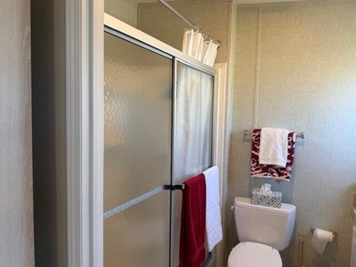 Light, Bright, and Airy Home in Spanish Lakes One (55+ on Spanish Lakes I in Florida - for sale on GolfHomes.com, golf home, golf lot