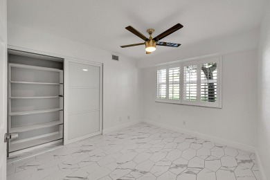 Beautifully updated 3 bedroom, 2 bath first-floor corner condo on Sunrise Lakes Phase IV Golf Course in Florida - for sale on GolfHomes.com, golf home, golf lot