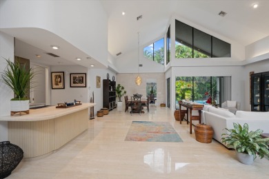 Welcome to this architectural gem in Eastpointe Country Club on Eastpointe Country Club in Florida - for sale on GolfHomes.com, golf home, golf lot