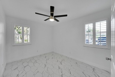 Beautifully updated 3 bedroom, 2 bath first-floor corner condo on Sunrise Lakes Phase IV Golf Course in Florida - for sale on GolfHomes.com, golf home, golf lot