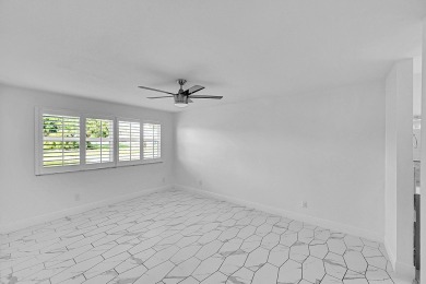 Beautifully updated 3 bedroom, 2 bath first-floor corner condo on Sunrise Lakes Phase IV Golf Course in Florida - for sale on GolfHomes.com, golf home, golf lot