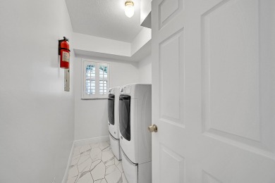Beautifully updated 3 bedroom, 2 bath first-floor corner condo on Sunrise Lakes Phase IV Golf Course in Florida - for sale on GolfHomes.com, golf home, golf lot