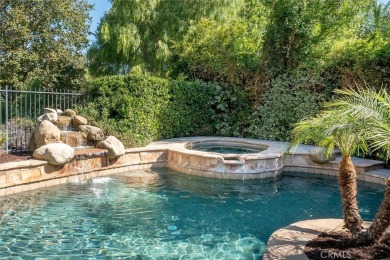 This Valencia Woodlands Ironwood pool home offers a rare large on Valencia Country Club in California - for sale on GolfHomes.com, golf home, golf lot