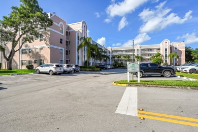 Beautifully updated 3 bedroom, 2 bath first-floor corner condo on Sunrise Lakes Phase IV Golf Course in Florida - for sale on GolfHomes.com, golf home, golf lot