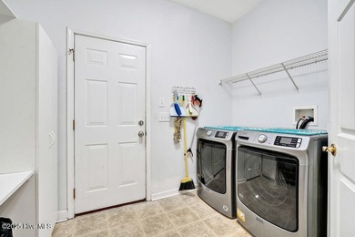 This spacious, 4-bedroom home offers an open floor plan for the on Carolina Shores Golf Course in North Carolina - for sale on GolfHomes.com, golf home, golf lot