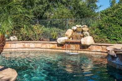 This Valencia Woodlands Ironwood pool home offers a rare large on Valencia Country Club in California - for sale on GolfHomes.com, golf home, golf lot