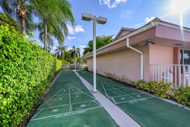 Beautifully updated 3 bedroom, 2 bath first-floor corner condo on Sunrise Lakes Phase IV Golf Course in Florida - for sale on GolfHomes.com, golf home, golf lot