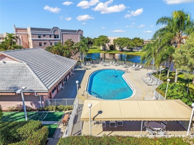 Beautifully updated 3 bedroom, 2 bath first-floor corner condo on Sunrise Lakes Phase IV Golf Course in Florida - for sale on GolfHomes.com, golf home, golf lot