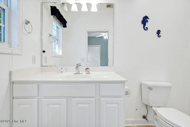 This spacious, 4-bedroom home offers an open floor plan for the on Carolina Shores Golf Course in North Carolina - for sale on GolfHomes.com, golf home, golf lot