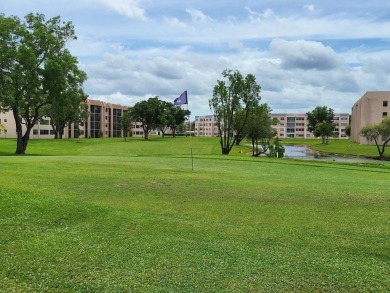 Beautifully updated 3 bedroom, 2 bath first-floor corner condo on Sunrise Lakes Phase IV Golf Course in Florida - for sale on GolfHomes.com, golf home, golf lot
