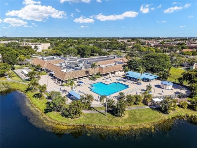 Beautifully updated 3 bedroom, 2 bath first-floor corner condo on Sunrise Lakes Phase IV Golf Course in Florida - for sale on GolfHomes.com, golf home, golf lot