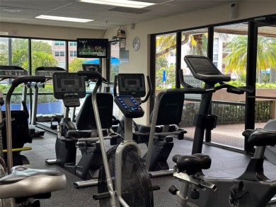 Beautifully updated 3 bedroom, 2 bath first-floor corner condo on Sunrise Lakes Phase IV Golf Course in Florida - for sale on GolfHomes.com, golf home, golf lot