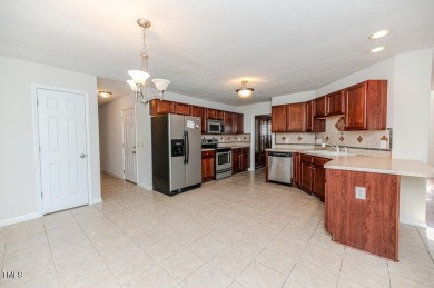 Welcome to Carolina Lakes, where you can live the vacation on Carolina Lakes Country Club in North Carolina - for sale on GolfHomes.com, golf home, golf lot