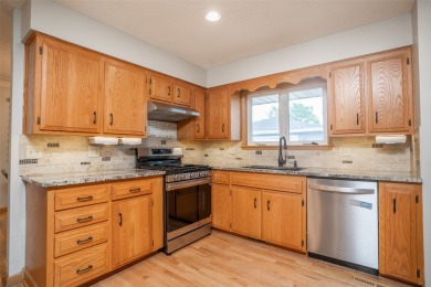 A must to see this sharp three bedroom ranch home overlooking on Grand View Golf Course in Iowa - for sale on GolfHomes.com, golf home, golf lot