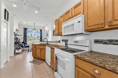 Well maintained Bristol floor plan with EXPANSIVE views of 7th on Kings Gate Golf Club in Florida - for sale on GolfHomes.com, golf home, golf lot