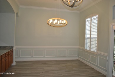 Stunning 4-bedroom, 3-bath home located in the highly desired on LPGA International Golf Course in Florida - for sale on GolfHomes.com, golf home, golf lot