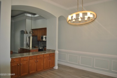 Stunning 4-bedroom, 3-bath home located in the highly desired on LPGA International Golf Course in Florida - for sale on GolfHomes.com, golf home, golf lot