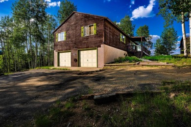 Located close to the golf course and on over an acre of land on Angel Fire Resort Country Club in New Mexico - for sale on GolfHomes.com, golf home, golf lot