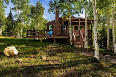 Located close to the golf course and on over an acre of land on Angel Fire Resort Country Club in New Mexico - for sale on GolfHomes.com, golf home, golf lot