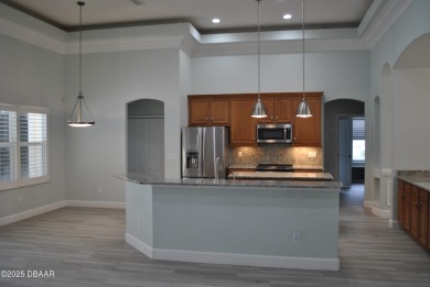 Stunning 4-bedroom, 3-bath home located in the highly desired on LPGA International Golf Course in Florida - for sale on GolfHomes.com, golf home, golf lot