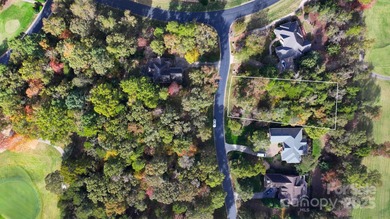 Located on the par 5 11th hole at the Old North State Club golf on Old North State Club at Uwharrie Point Golf community in North Carolina - for sale on GolfHomes.com, golf home, golf lot