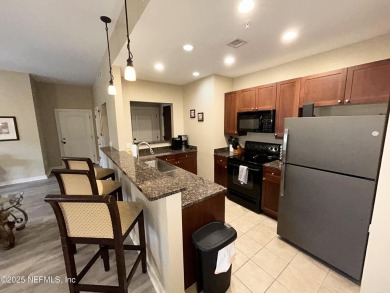 Snow bird or Investors Delight! Luxurious 2 bedroom condo with a on King and Bear Golf Course/World Golf Village in Florida - for sale on GolfHomes.com, golf home, golf lot