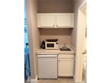 This exquisite first-floor condominium boasts unobstructed views on The Legacy Golf and Tennis Club in Florida - for sale on GolfHomes.com, golf home, golf lot