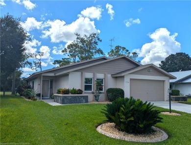 Charming, beautifully maintained, golf course home! Set in the on  in Florida - for sale on GolfHomes.com, golf home, golf lot