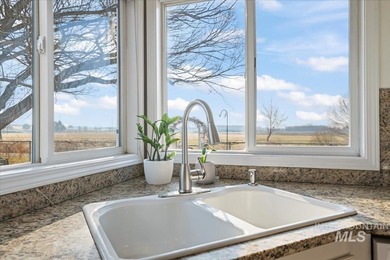 Welcome home to a truly special two-story farmhouse with on Centennial Golf Course in Idaho - for sale on GolfHomes.com, golf home, golf lot