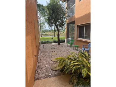 This exquisite first-floor condominium boasts unobstructed views on The Legacy Golf and Tennis Club in Florida - for sale on GolfHomes.com, golf home, golf lot