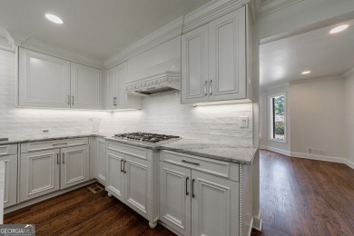 Prepare to be enchanted by this storybook stone estate, a true on Atlanta Country Club in Georgia - for sale on GolfHomes.com, golf home, golf lot