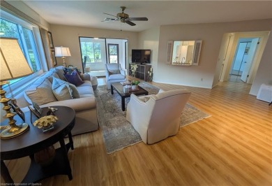Charming, beautifully maintained, golf course home! Set in the on  in Florida - for sale on GolfHomes.com, golf home, golf lot