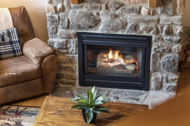 Tucked within the scenic Stonebridge Golf Village, this cozy on Ledgestone Country Club and Golf Course in Missouri - for sale on GolfHomes.com, golf home, golf lot