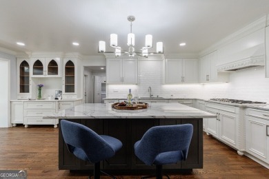 Prepare to be enchanted by this storybook stone estate, a true on Atlanta Country Club in Georgia - for sale on GolfHomes.com, golf home, golf lot
