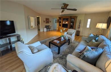 Charming, beautifully maintained, golf course home! Set in the on  in Florida - for sale on GolfHomes.com, golf home, golf lot