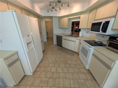 Charming, beautifully maintained, golf course home! Set in the on  in Florida - for sale on GolfHomes.com, golf home, golf lot