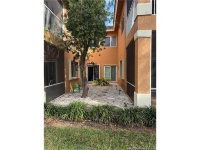 This exquisite first-floor condominium boasts unobstructed views on The Legacy Golf and Tennis Club in Florida - for sale on GolfHomes.com, golf home, golf lot