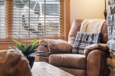 Tucked within the scenic Stonebridge Golf Village, this cozy on Ledgestone Country Club and Golf Course in Missouri - for sale on GolfHomes.com, golf home, golf lot