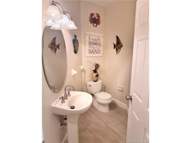 This exquisite first-floor condominium boasts unobstructed views on The Legacy Golf and Tennis Club in Florida - for sale on GolfHomes.com, golf home, golf lot
