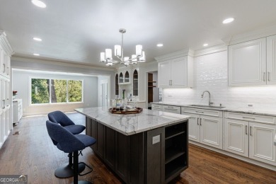 Prepare to be enchanted by this storybook stone estate, a true on Atlanta Country Club in Georgia - for sale on GolfHomes.com, golf home, golf lot
