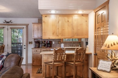 Tucked within the scenic Stonebridge Golf Village, this cozy on Ledgestone Country Club and Golf Course in Missouri - for sale on GolfHomes.com, golf home, golf lot