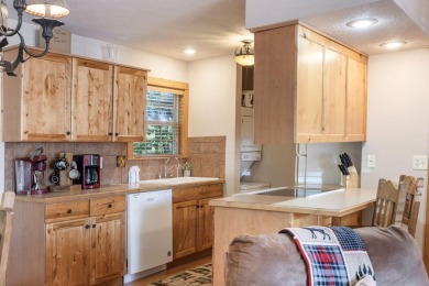Tucked within the scenic Stonebridge Golf Village, this cozy on Ledgestone Country Club and Golf Course in Missouri - for sale on GolfHomes.com, golf home, golf lot