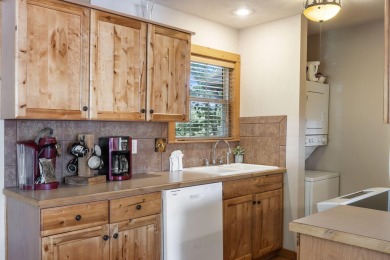 Tucked within the scenic Stonebridge Golf Village, this cozy on Ledgestone Country Club and Golf Course in Missouri - for sale on GolfHomes.com, golf home, golf lot