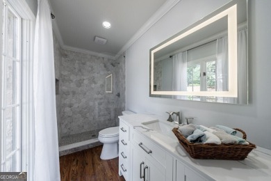 Prepare to be enchanted by this storybook stone estate, a true on Atlanta Country Club in Georgia - for sale on GolfHomes.com, golf home, golf lot