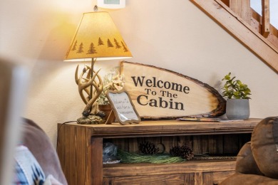 Tucked within the scenic Stonebridge Golf Village, this cozy on Ledgestone Country Club and Golf Course in Missouri - for sale on GolfHomes.com, golf home, golf lot