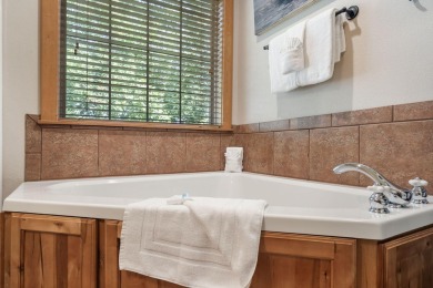 Tucked within the scenic Stonebridge Golf Village, this cozy on Ledgestone Country Club and Golf Course in Missouri - for sale on GolfHomes.com, golf home, golf lot
