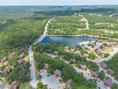 Tucked within the scenic Stonebridge Golf Village, this cozy on Ledgestone Country Club and Golf Course in Missouri - for sale on GolfHomes.com, golf home, golf lot