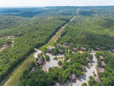 Tucked within the scenic Stonebridge Golf Village, this cozy on Ledgestone Country Club and Golf Course in Missouri - for sale on GolfHomes.com, golf home, golf lot