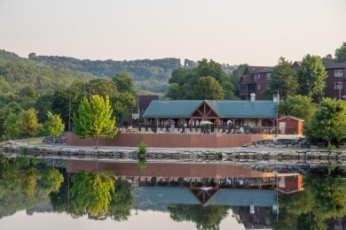 Tucked within the scenic Stonebridge Golf Village, this cozy on Ledgestone Country Club and Golf Course in Missouri - for sale on GolfHomes.com, golf home, golf lot